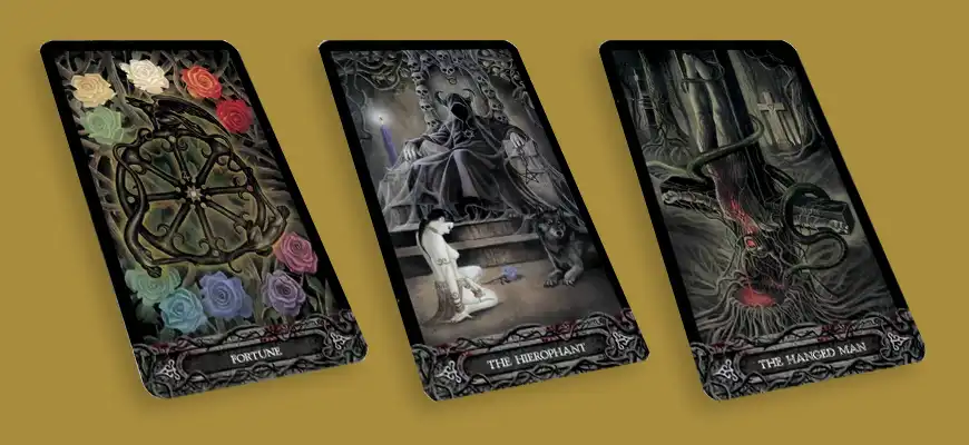 These are Fate, the Hermit and the Hanged Man of the Vampire Tarot deck Phantasmagoria